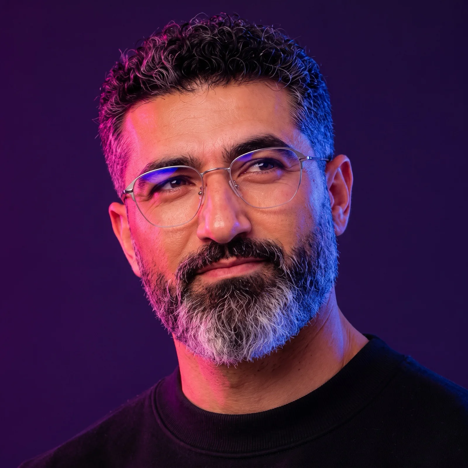 Neon-lit executive portrait of Ahmed Simary